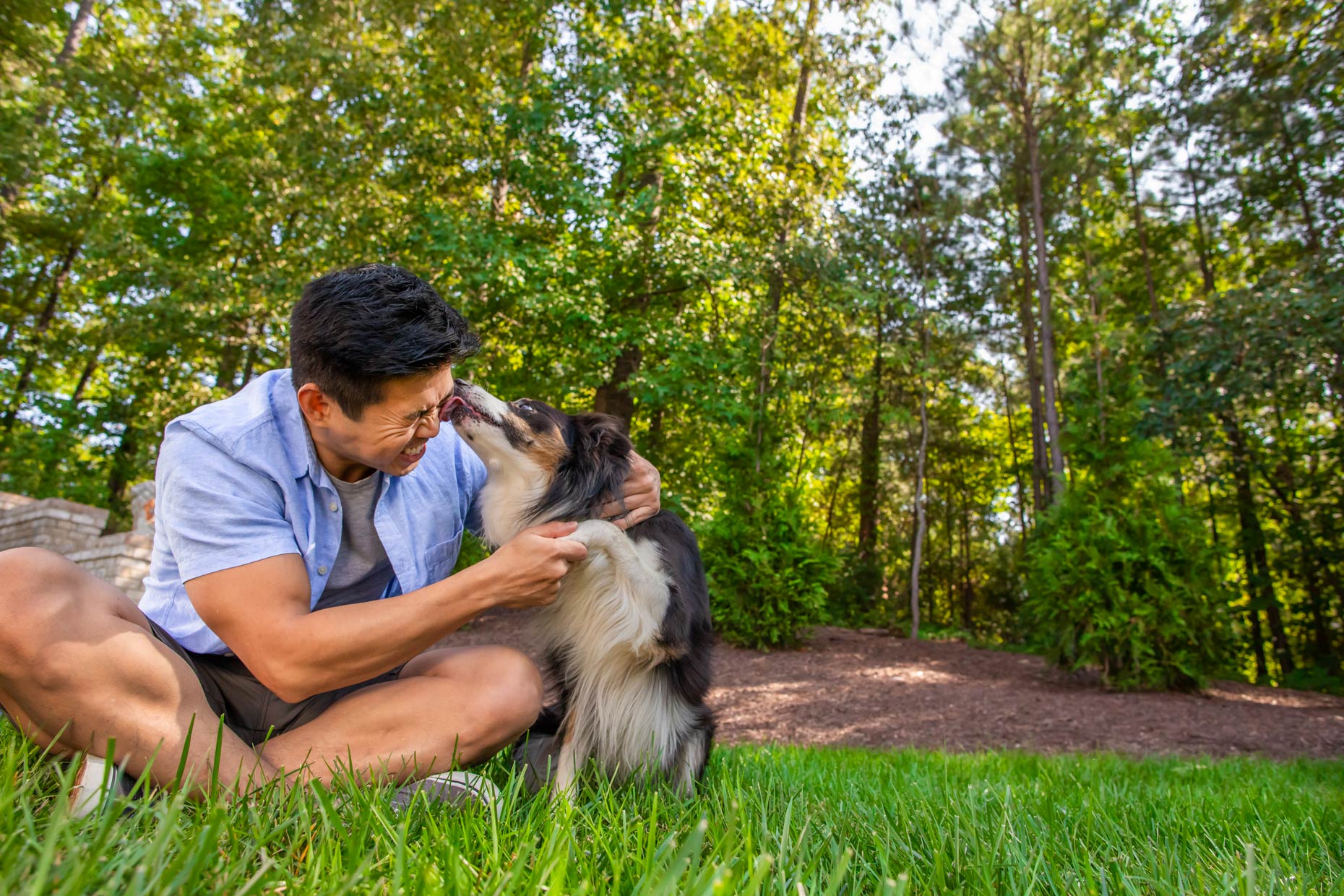 Asian-man-and-dog-in-yard_Robert_Holland_Trugreen