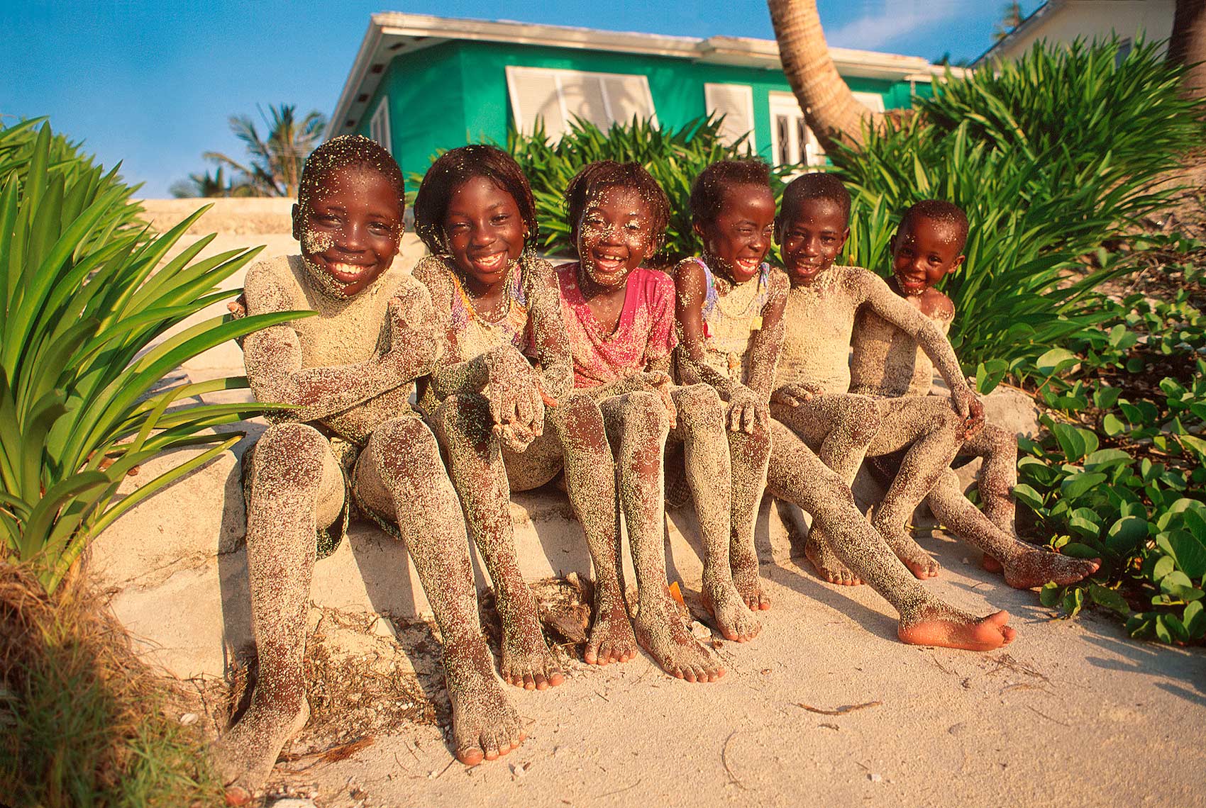 six Bahamian kids covered in sand_Bimini-kids_Robert-Holland.jpg