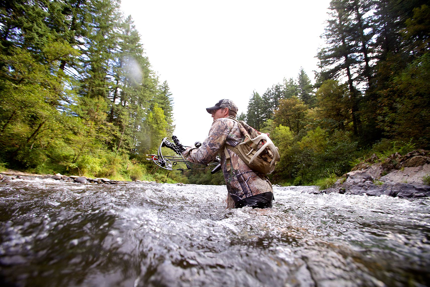 Robert-Holland_MG_4634_bow hunter crossing  Washougal River, Washington