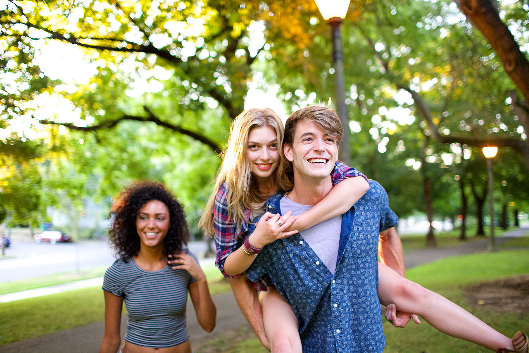 three young people  having fun, Irving Park, Portland Oregon_Robert-Holland_MG_6269