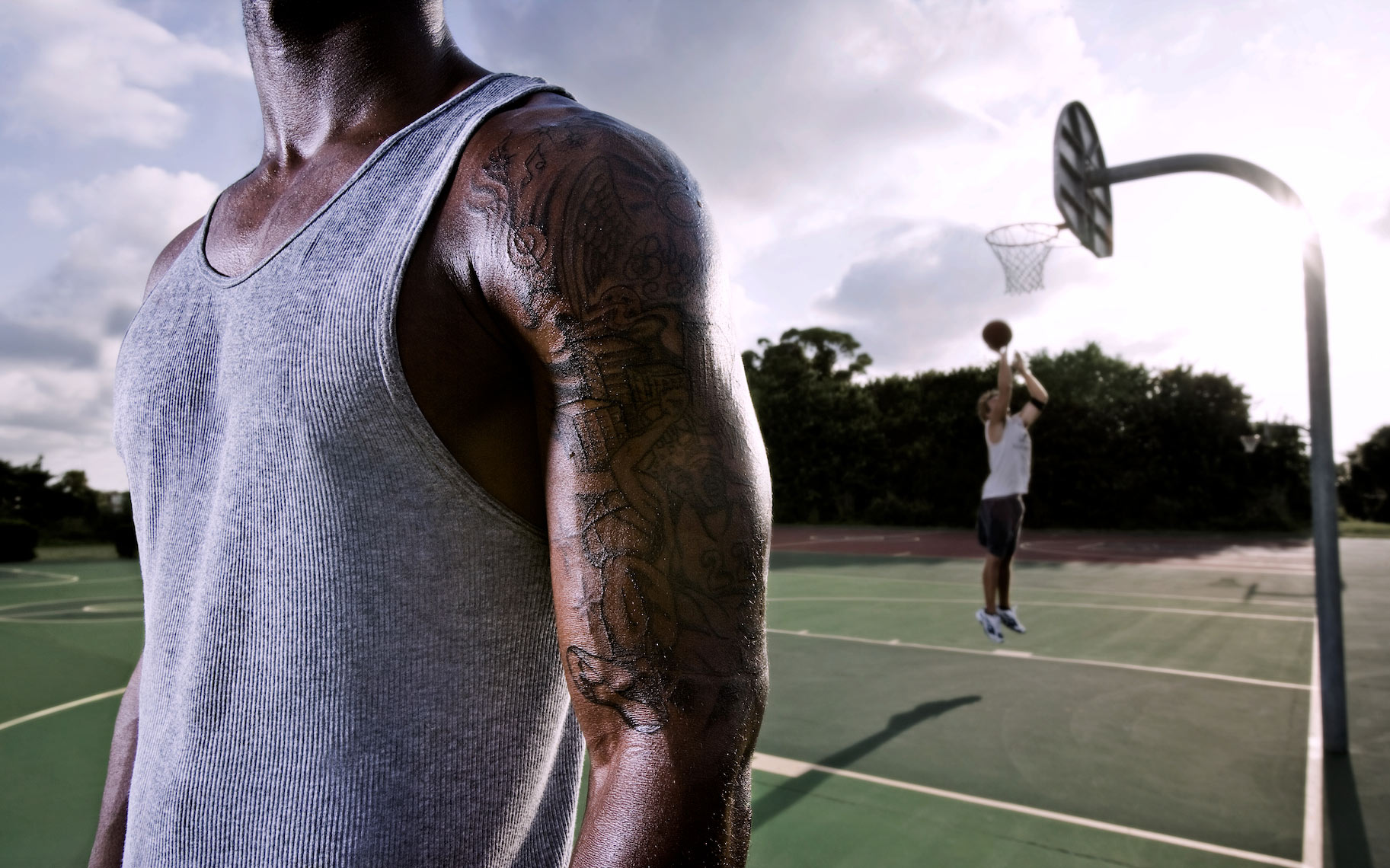 Closeup view arm and tatoos of basketball player_Robert-Holland.jpg