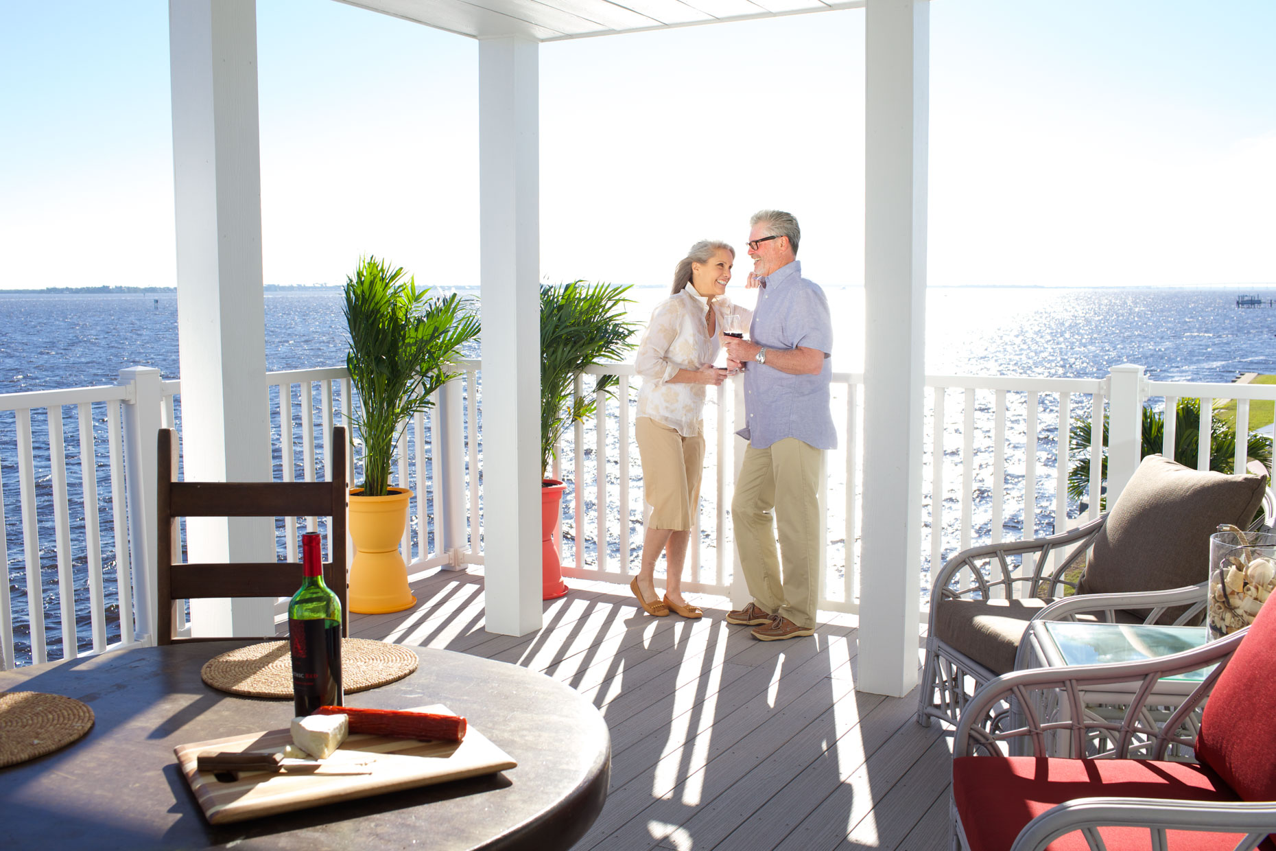 _MG_4096_RobertHolland_senior couple on waterfront patio of modular home