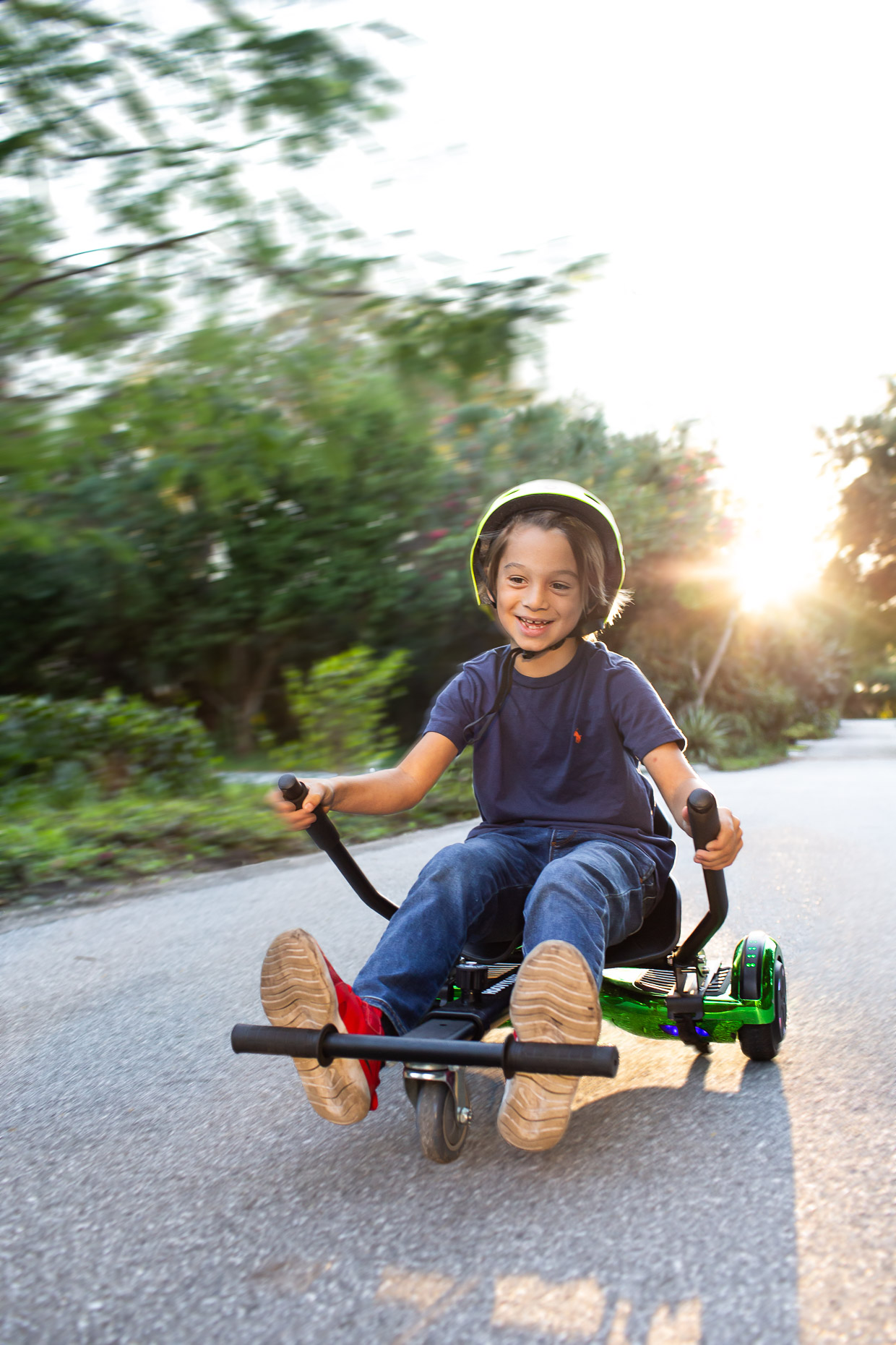 Young boy racing hover-board bike on road _MG_5192-Edit__RobertHolland