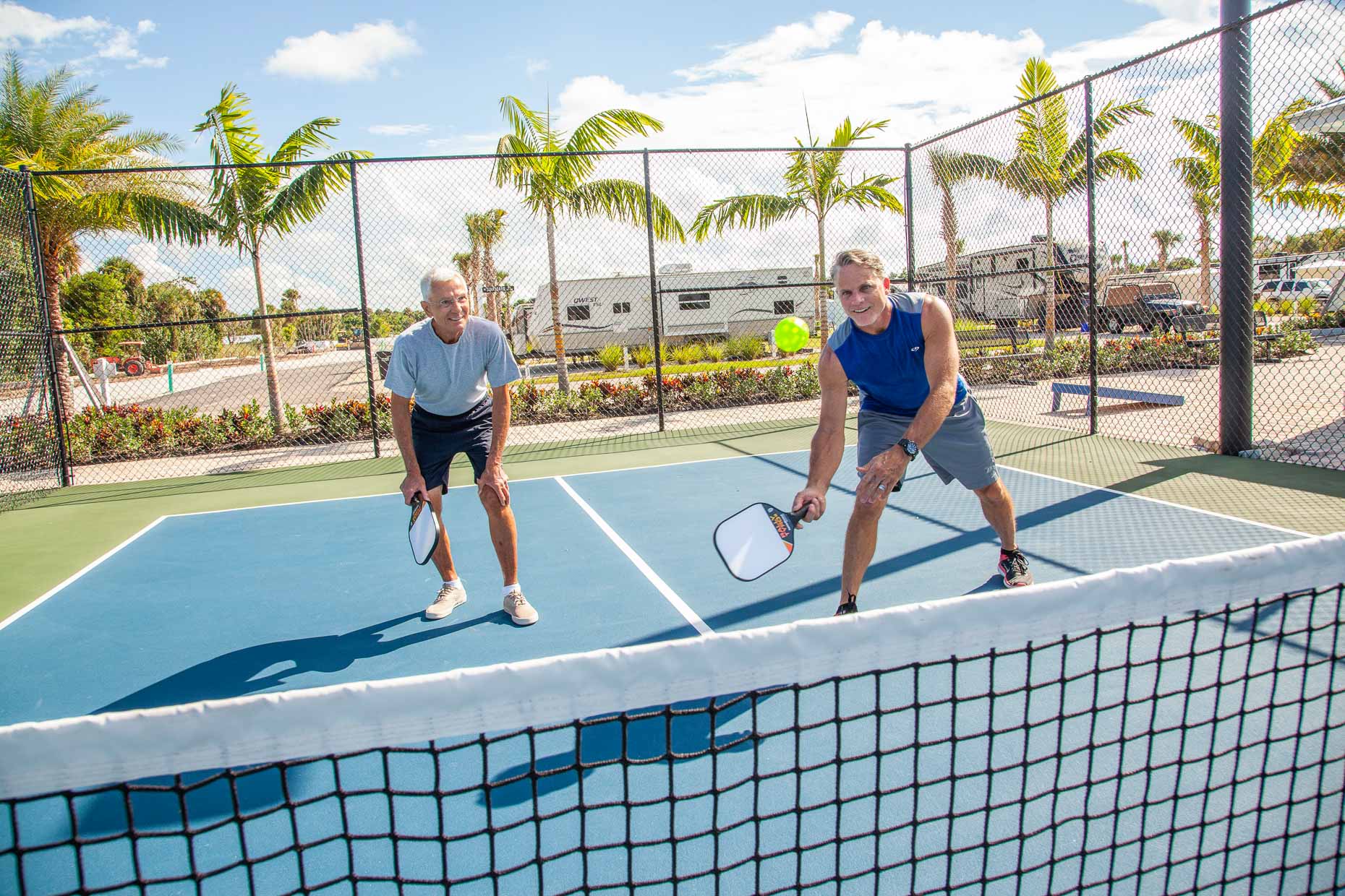 _MG_9862_RobertHolland_adult father and son playing pickleball